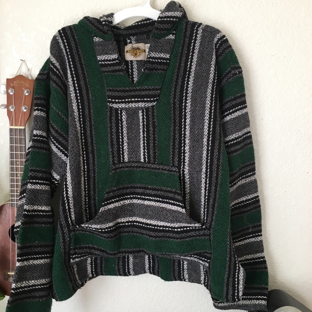 Green, grey, black drug rug